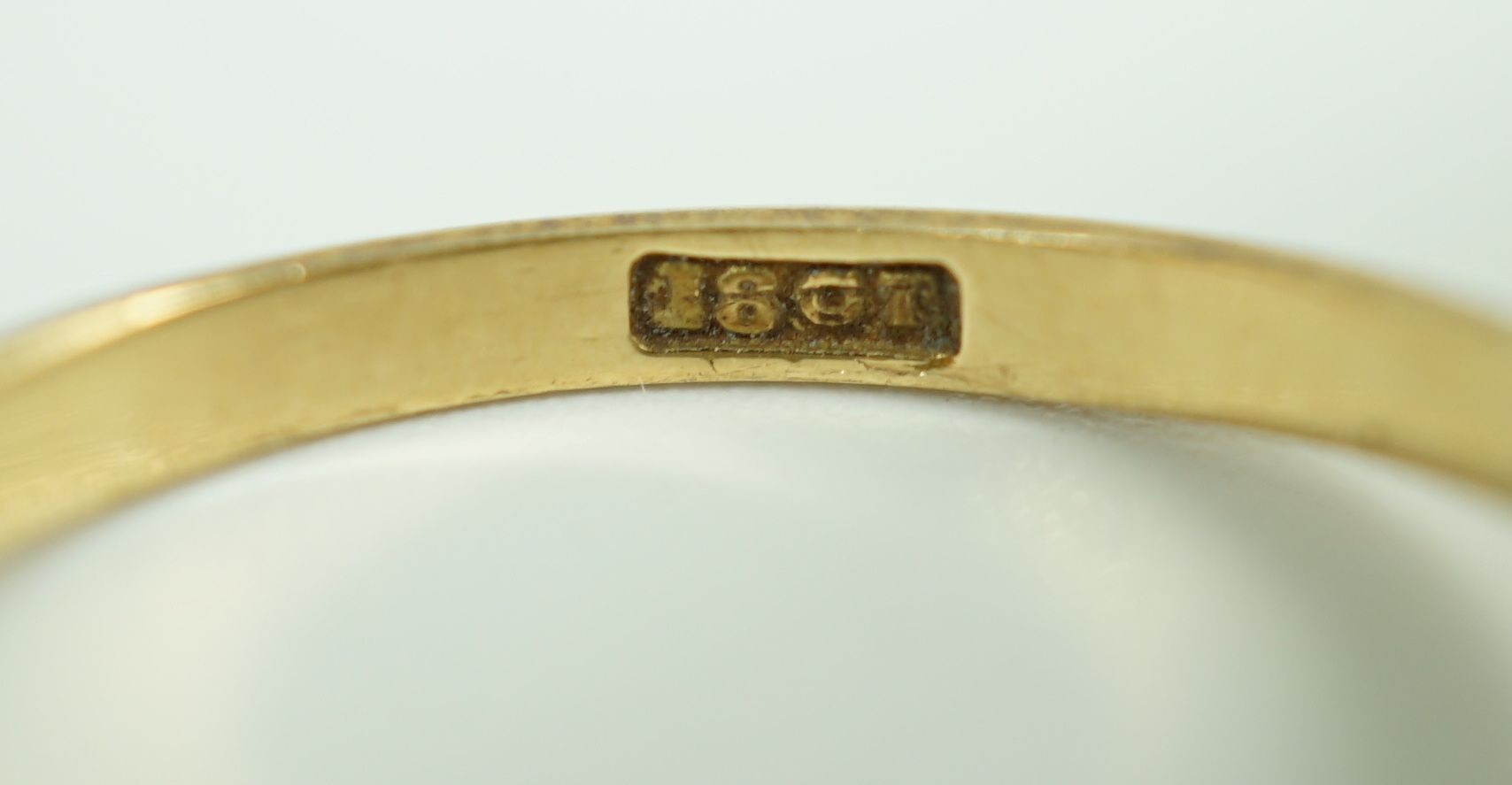 An 18ct gold and graduated five stone opal half hoop ring, with diamond chip spacers